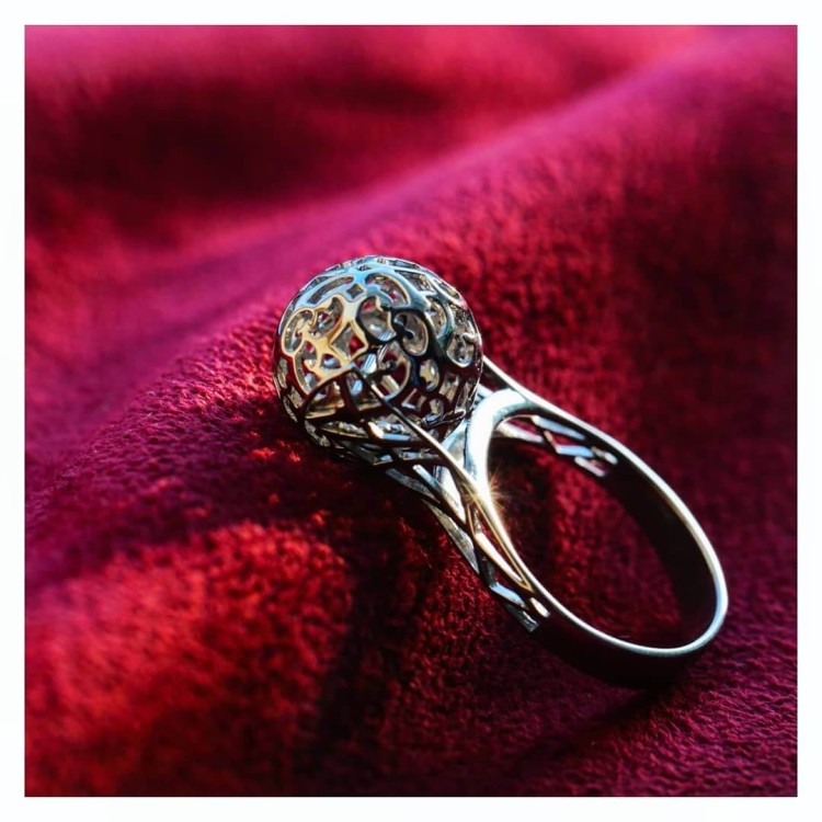 Серебряное кольцо с крутящимся шаром